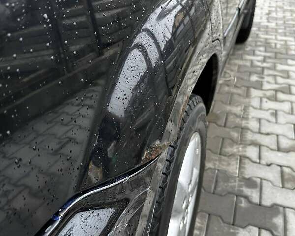 Черный Ниссан ИксТрейл, объемом двигателя 2.5 л и пробегом 282 тыс. км за 6250 $, фото 7 на Automoto.ua