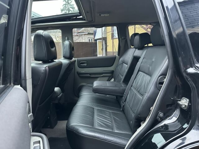 Черный Ниссан ИксТрейл, объемом двигателя 2.2 л и пробегом 168 тыс. км за 6699 $, фото 16 на Automoto.ua