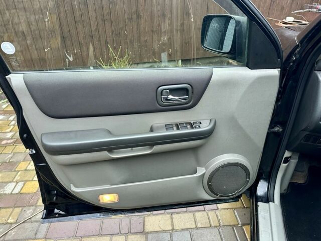 Черный Ниссан ИксТрейл, объемом двигателя 2.2 л и пробегом 168 тыс. км за 6699 $, фото 17 на Automoto.ua