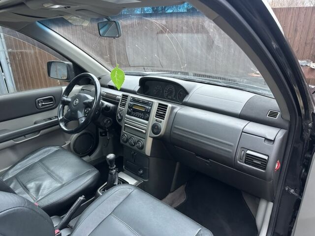 Черный Ниссан ИксТрейл, объемом двигателя 2.2 л и пробегом 168 тыс. км за 6699 $, фото 13 на Automoto.ua