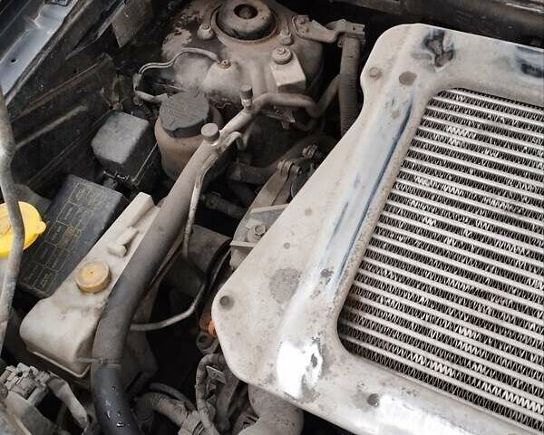 Черный Ниссан ИксТрейл, объемом двигателя 2.2 л и пробегом 373 тыс. км за 5800 $, фото 14 на Automoto.ua