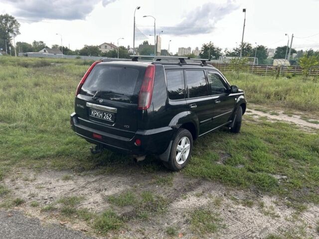 Черный Ниссан ИксТрейл, объемом двигателя 2.2 л и пробегом 252 тыс. км за 3600 $, фото 3 на Automoto.ua