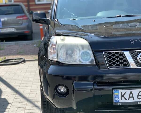 Черный Ниссан ИксТрейл, объемом двигателя 2.2 л и пробегом 227 тыс. км за 8300 $, фото 17 на Automoto.ua