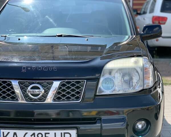 Черный Ниссан ИксТрейл, объемом двигателя 2.2 л и пробегом 227 тыс. км за 8300 $, фото 21 на Automoto.ua