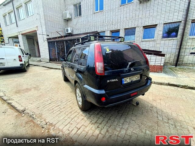 Черный Ниссан ИксТрейл, объемом двигателя 2.2 л и пробегом 340 тыс. км за 5000 $, фото 3 на Automoto.ua