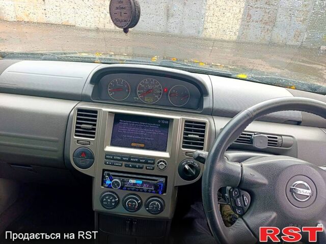 Черный Ниссан ИксТрейл, объемом двигателя 2.2 л и пробегом 180 тыс. км за 4500 $, фото 13 на Automoto.ua