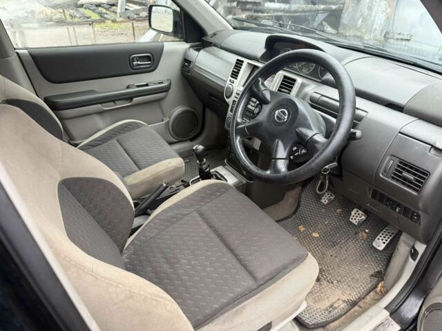 Чорний Ніссан ІксТрейл, об'ємом двигуна 2 л та пробігом 123 тис. км за 3100 $, фото 5 на Automoto.ua