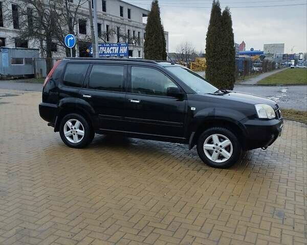 Черный Ниссан ИксТрейл, объемом двигателя 2.2 л и пробегом 373 тыс. км за 5800 $, фото 7 на Automoto.ua