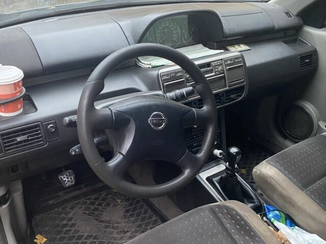 Черный Ниссан ИксТрейл, объемом двигателя 2.2 л и пробегом 397 тыс. км за 3700 $, фото 4 на Automoto.ua