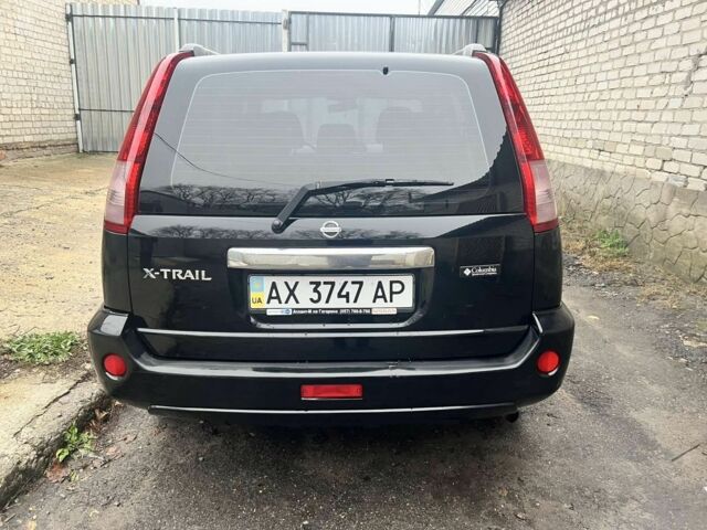 Черный Ниссан ИксТрейл, объемом двигателя 2 л и пробегом 150 тыс. км за 7700 $, фото 1 на Automoto.ua