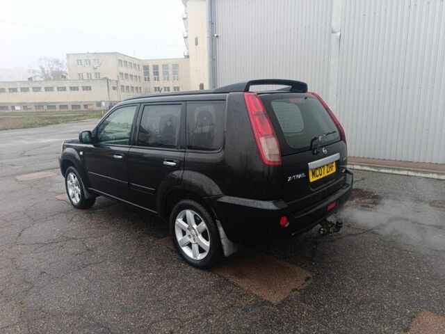 Чорний Ніссан ІксТрейл, об'ємом двигуна 2 л та пробігом 123 тис. км за 3100 $, фото 2 на Automoto.ua