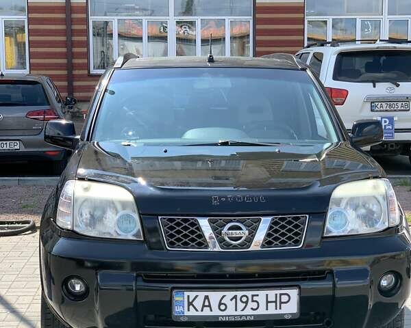 Черный Ниссан ИксТрейл, объемом двигателя 2.2 л и пробегом 227 тыс. км за 8300 $, фото 19 на Automoto.ua