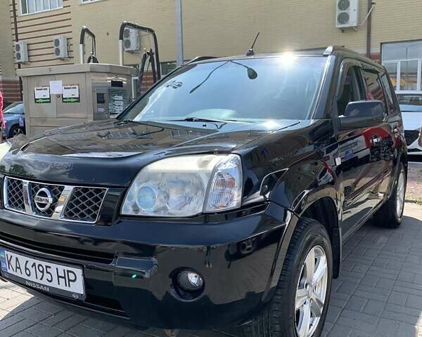 Черный Ниссан ИксТрейл, объемом двигателя 2.2 л и пробегом 227 тыс. км за 8300 $, фото 1 на Automoto.ua