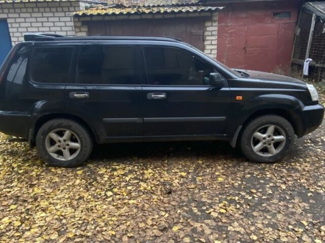 Черный Ниссан ИксТрейл, объемом двигателя 2.2 л и пробегом 397 тыс. км за 3700 $, фото 2 на Automoto.ua