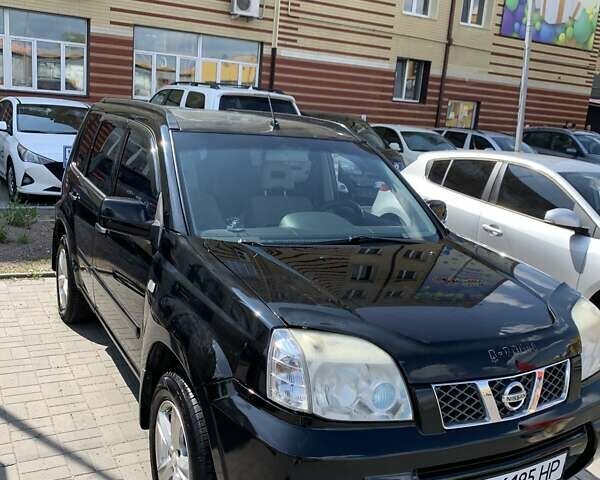 Черный Ниссан ИксТрейл, объемом двигателя 2.2 л и пробегом 227 тыс. км за 8300 $, фото 6 на Automoto.ua