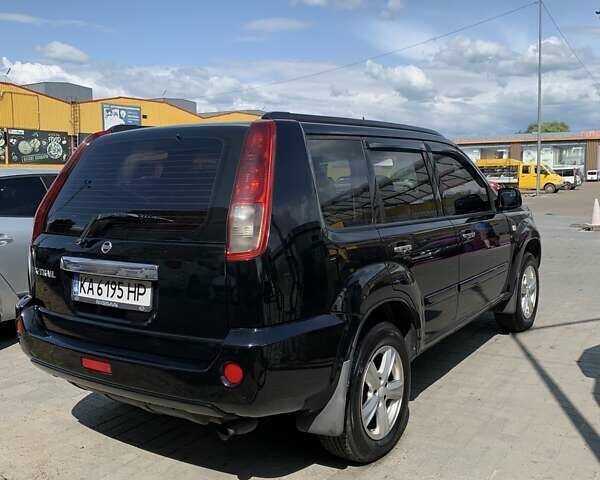 Черный Ниссан ИксТрейл, объемом двигателя 2.2 л и пробегом 227 тыс. км за 8300 $, фото 29 на Automoto.ua