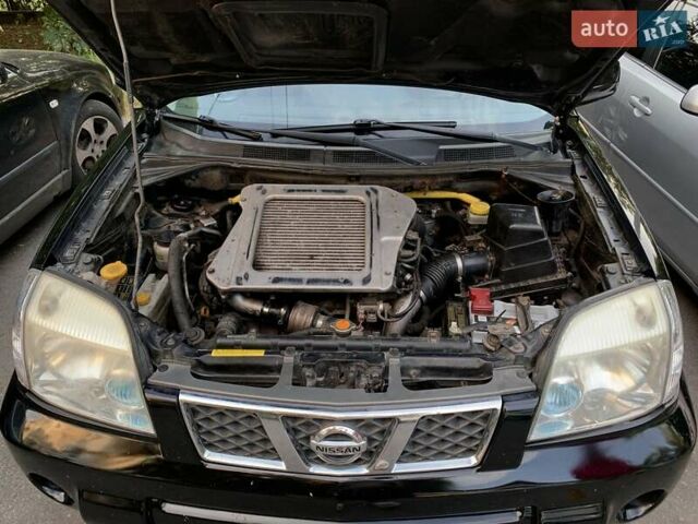 Черный Ниссан ИксТрейл, объемом двигателя 2.2 л и пробегом 227 тыс. км за 8300 $, фото 58 на Automoto.ua