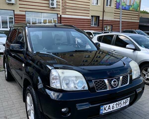 Черный Ниссан ИксТрейл, объемом двигателя 2.2 л и пробегом 227 тыс. км за 8300 $, фото 10 на Automoto.ua