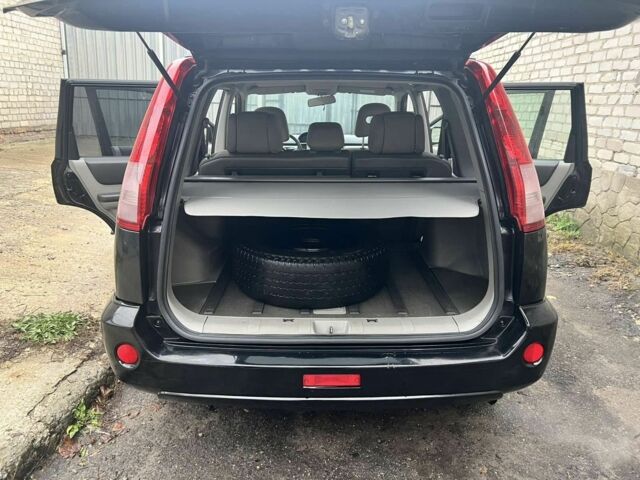 Черный Ниссан ИксТрейл, объемом двигателя 2 л и пробегом 150 тыс. км за 7700 $, фото 7 на Automoto.ua