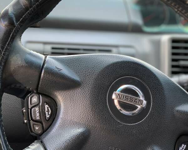 Черный Ниссан ИксТрейл, объемом двигателя 2.2 л и пробегом 227 тыс. км за 8300 $, фото 40 на Automoto.ua