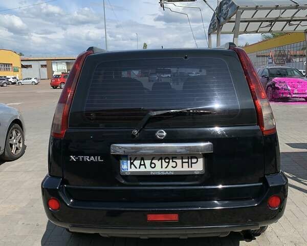 Черный Ниссан ИксТрейл, объемом двигателя 2.2 л и пробегом 227 тыс. км за 8300 $, фото 34 на Automoto.ua