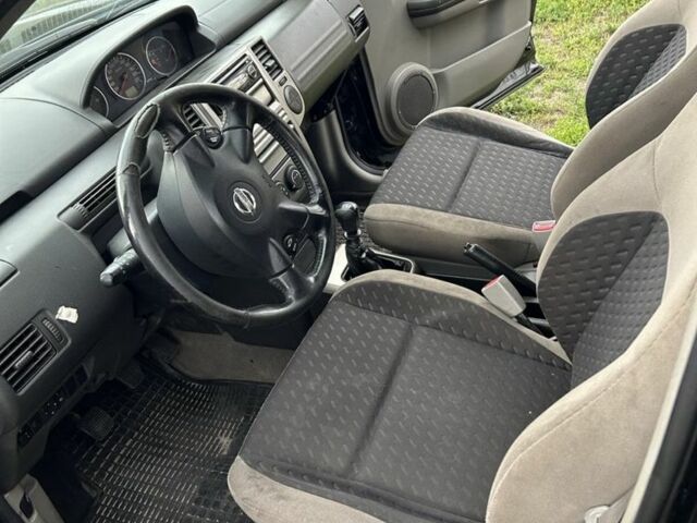 Черный Ниссан ИксТрейл, объемом двигателя 2.2 л и пробегом 252 тыс. км за 3600 $, фото 5 на Automoto.ua