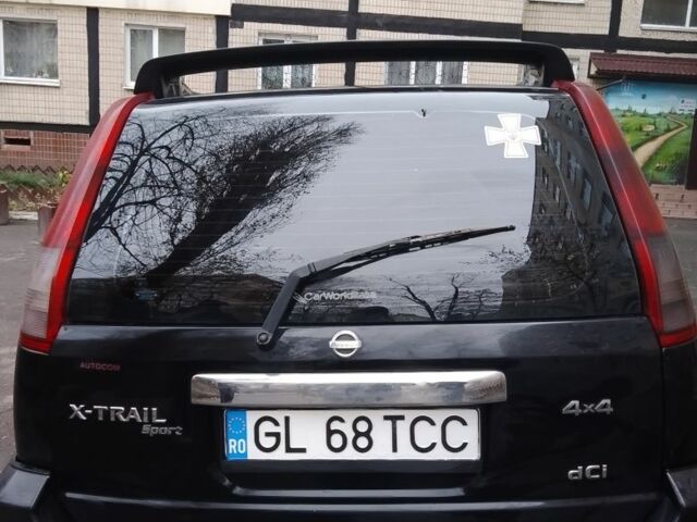 Черный Ниссан ИксТрейл, объемом двигателя 2.2 л и пробегом 260 тыс. км за 4500 $, фото 3 на Automoto.ua