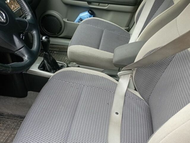 Черный Ниссан ИксТрейл, объемом двигателя 2 л и пробегом 196 тыс. км за 4300 $, фото 5 на Automoto.ua