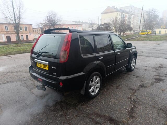 Чорний Ніссан ІксТрейл, об'ємом двигуна 2 л та пробігом 123 тис. км за 3100 $, фото 4 на Automoto.ua