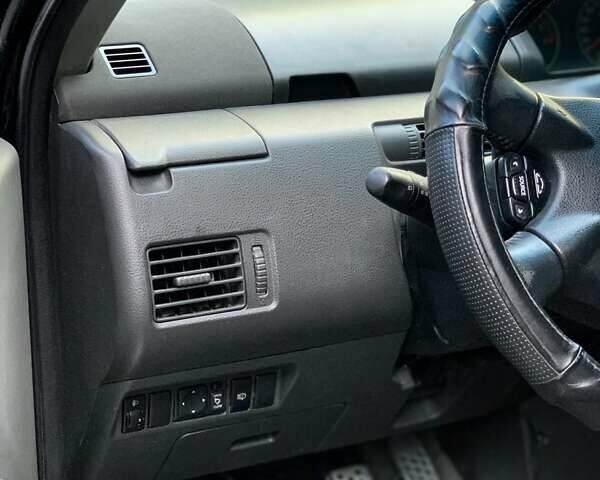 Черный Ниссан ИксТрейл, объемом двигателя 2.2 л и пробегом 227 тыс. км за 8300 $, фото 42 на Automoto.ua