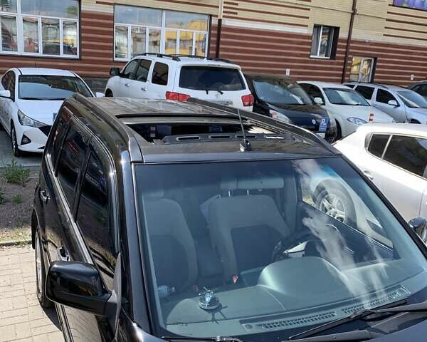 Черный Ниссан ИксТрейл, объемом двигателя 2.2 л и пробегом 227 тыс. км за 8300 $, фото 14 на Automoto.ua