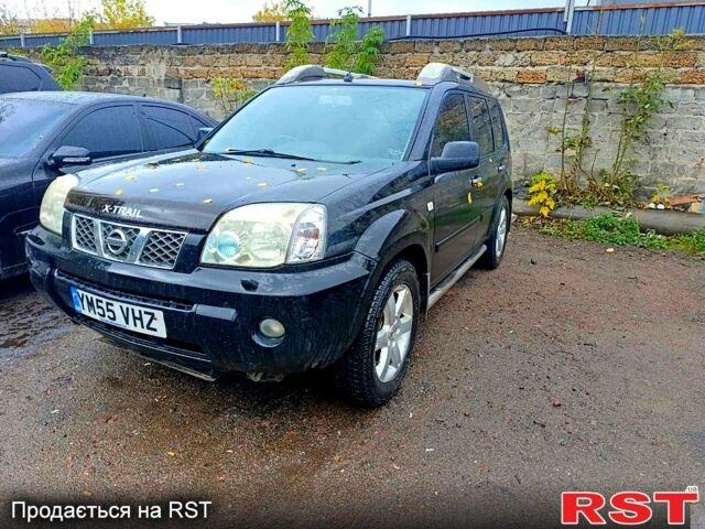 Черный Ниссан ИксТрейл, объемом двигателя 2.2 л и пробегом 180 тыс. км за 4500 $, фото 4 на Automoto.ua