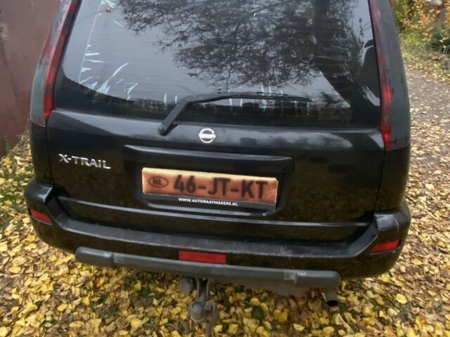 Черный Ниссан ИксТрейл, объемом двигателя 2.2 л и пробегом 397 тыс. км за 3700 $, фото 1 на Automoto.ua