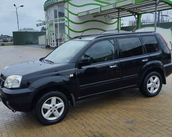 Черный Ниссан ИксТрейл, объемом двигателя 2.2 л и пробегом 373 тыс. км за 5800 $, фото 6 на Automoto.ua