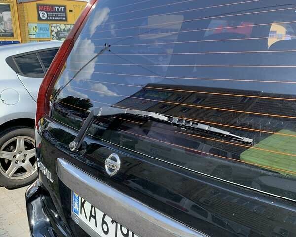 Черный Ниссан ИксТрейл, объемом двигателя 2.2 л и пробегом 227 тыс. км за 8300 $, фото 36 на Automoto.ua