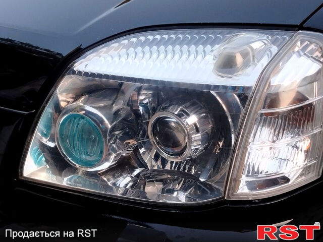 Черный Ниссан ИксТрейл, объемом двигателя 2 л и пробегом 200 тыс. км за 6200 $, фото 4 на Automoto.ua