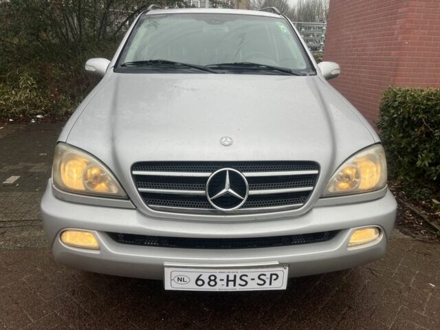 Черный Ниссан ИксТрейл, объемом двигателя 2.2 л и пробегом 260 тыс. км за 4254 $, фото 6 на Automoto.ua