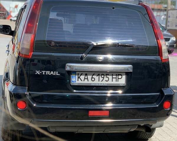 Черный Ниссан ИксТрейл, объемом двигателя 2.2 л и пробегом 227 тыс. км за 8300 $, фото 35 на Automoto.ua