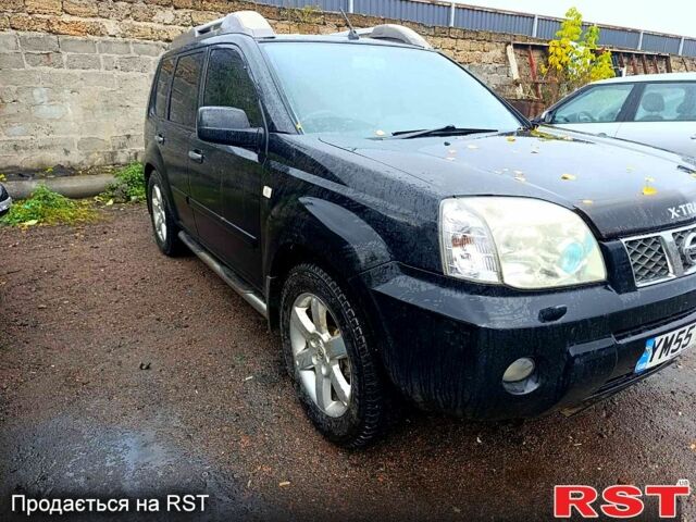 Черный Ниссан ИксТрейл, объемом двигателя 2.2 л и пробегом 180 тыс. км за 4500 $, фото 1 на Automoto.ua