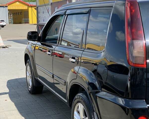 Черный Ниссан ИксТрейл, объемом двигателя 2.2 л и пробегом 227 тыс. км за 8300 $, фото 32 на Automoto.ua