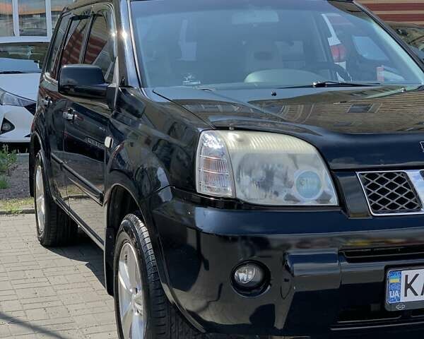 Черный Ниссан ИксТрейл, объемом двигателя 2.2 л и пробегом 227 тыс. км за 8300 $, фото 5 на Automoto.ua