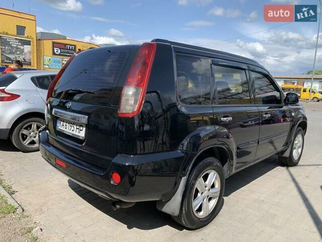 Черный Ниссан ИксТрейл, объемом двигателя 2.2 л и пробегом 227 тыс. км за 8300 $, фото 30 на Automoto.ua