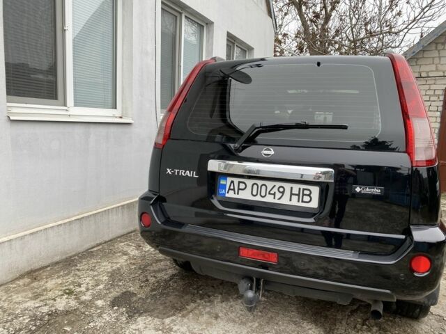 Черный Ниссан ИксТрейл, объемом двигателя 2 л и пробегом 300 тыс. км за 7000 $, фото 2 на Automoto.ua