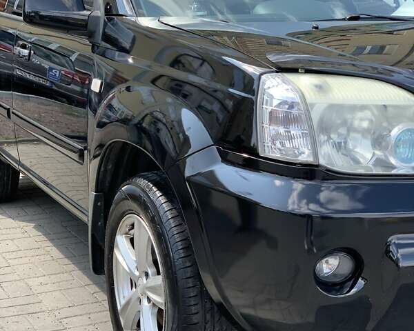 Черный Ниссан ИксТрейл, объемом двигателя 2.2 л и пробегом 227 тыс. км за 8300 $, фото 18 на Automoto.ua