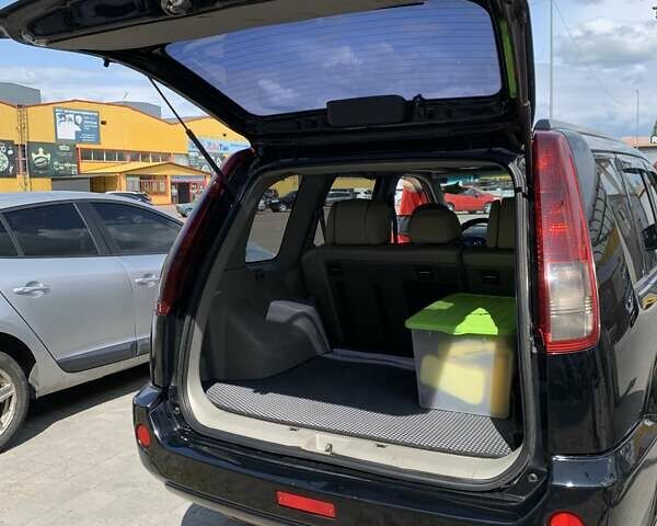 Черный Ниссан ИксТрейл, объемом двигателя 2.2 л и пробегом 227 тыс. км за 8300 $, фото 27 на Automoto.ua