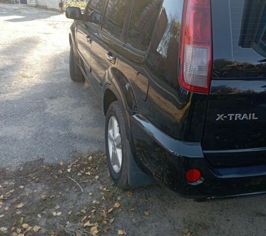 Черный Ниссан ИксТрейл, объемом двигателя 0 л и пробегом 196 тыс. км за 4100 $, фото 1 на Automoto.ua