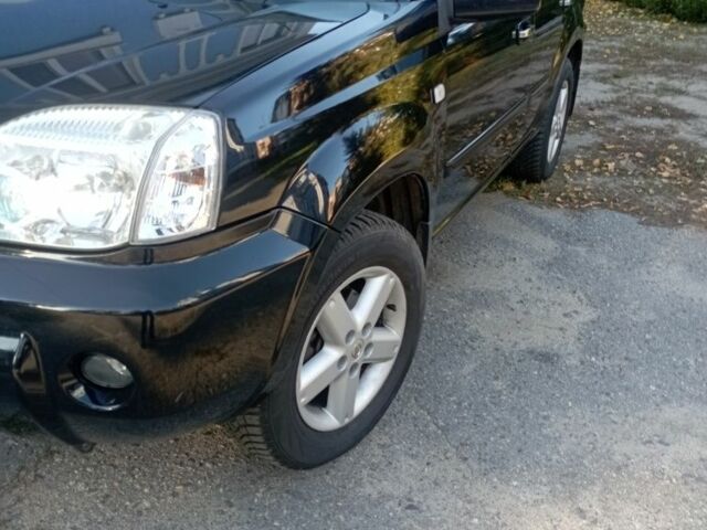 Черный Ниссан ИксТрейл, объемом двигателя 2 л и пробегом 196 тыс. км за 4300 $, фото 2 на Automoto.ua