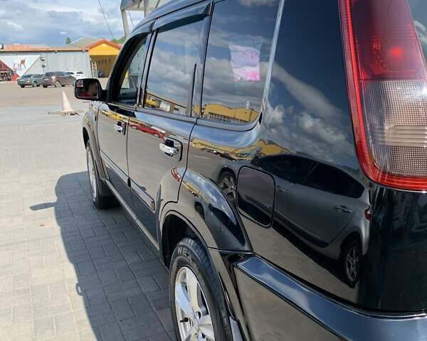 Черный Ниссан ИксТрейл, объемом двигателя 2.2 л и пробегом 227 тыс. км за 8300 $, фото 28 на Automoto.ua