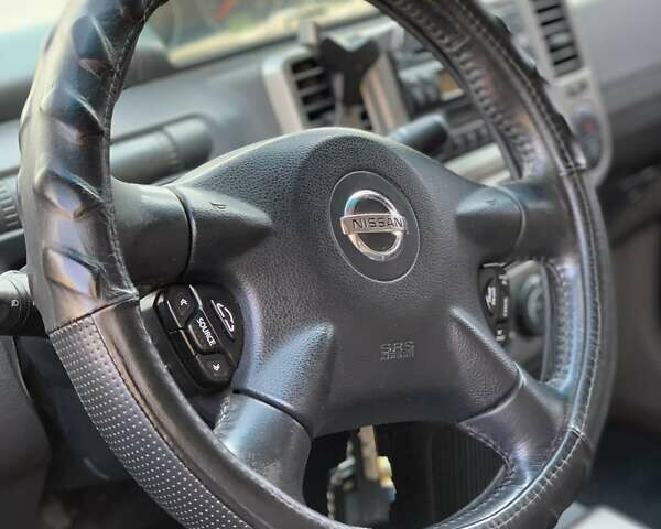 Черный Ниссан ИксТрейл, объемом двигателя 2.2 л и пробегом 227 тыс. км за 8300 $, фото 39 на Automoto.ua