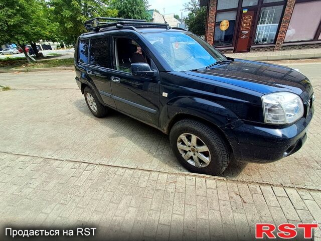 Черный Ниссан ИксТрейл, объемом двигателя 2.2 л и пробегом 340 тыс. км за 5000 $, фото 1 на Automoto.ua